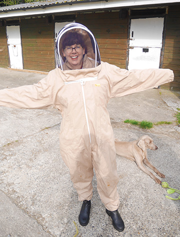Libby in a bee suit