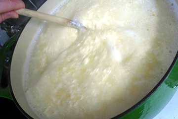 Stirring cheese